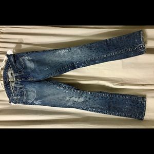Distressed Bebe Leopard print blue jeans